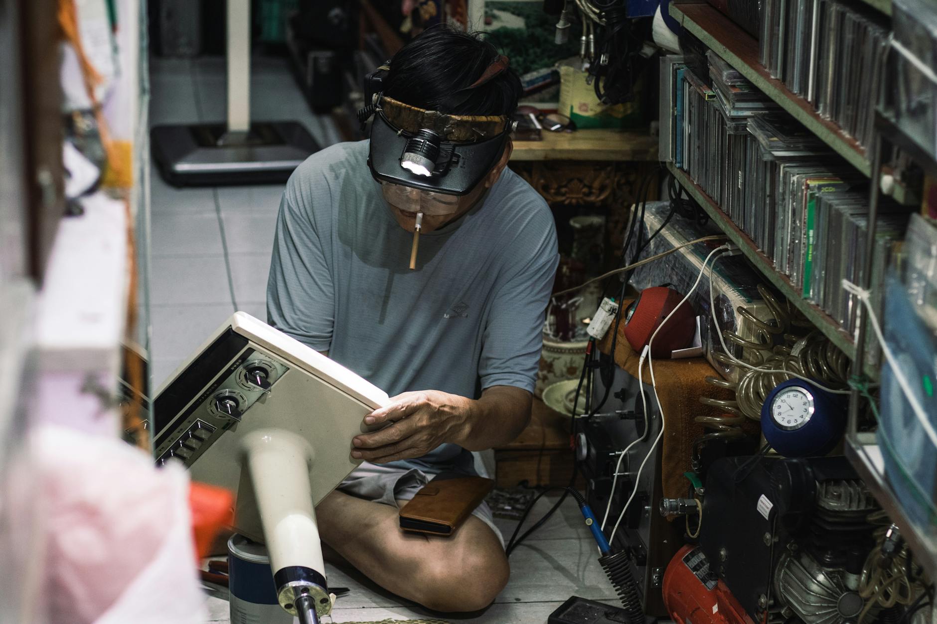 Appliance repair technician at work